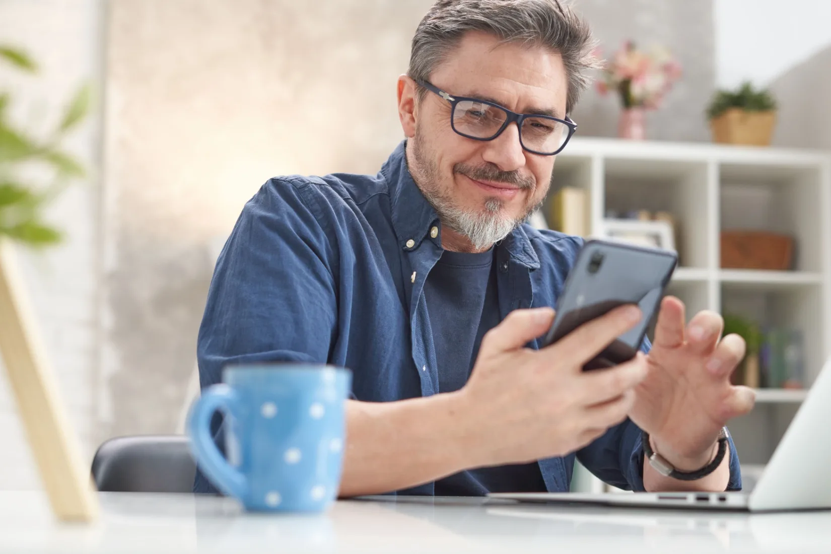 A man reading on his phone.