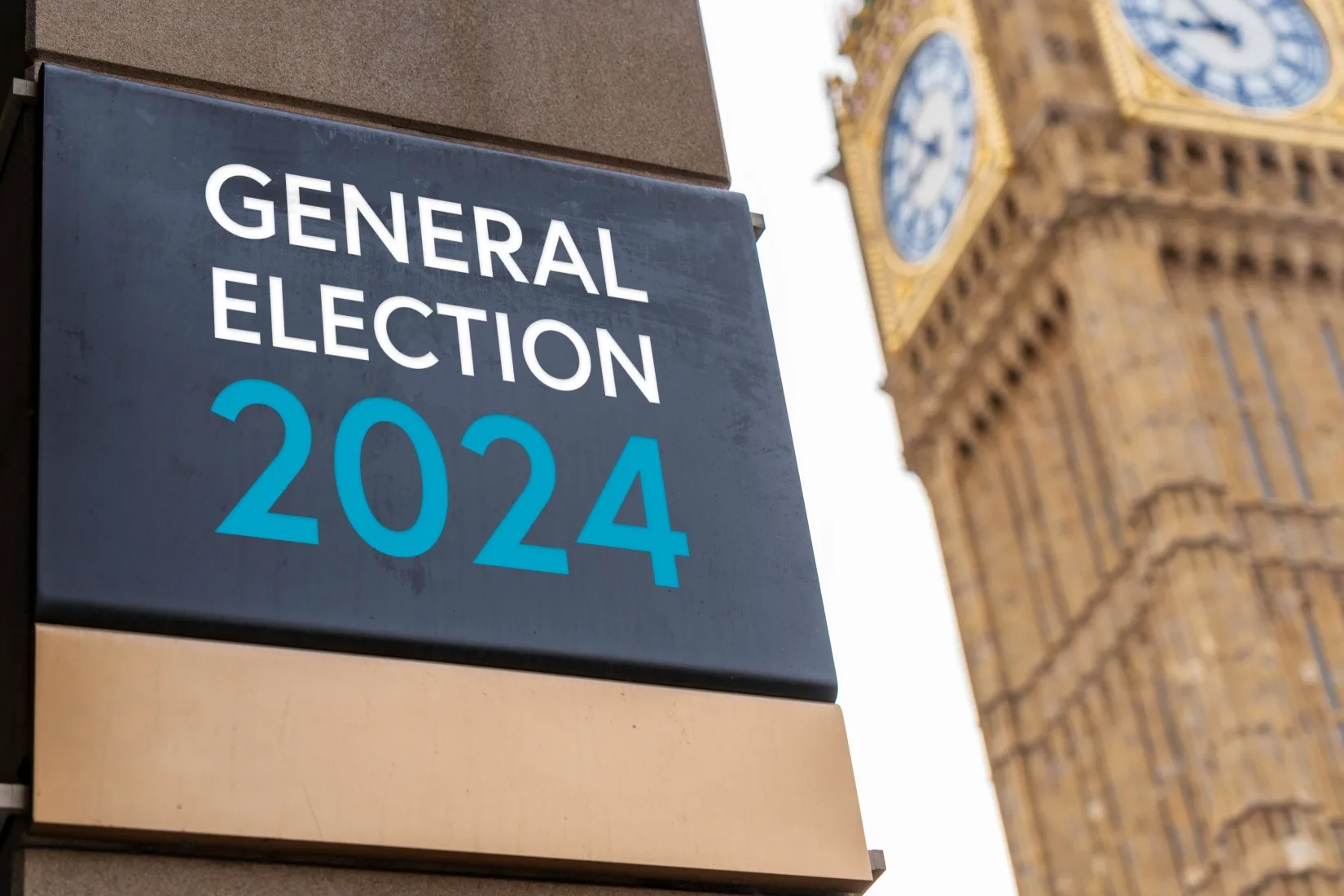 general election sign in front of the Palace of Westminster