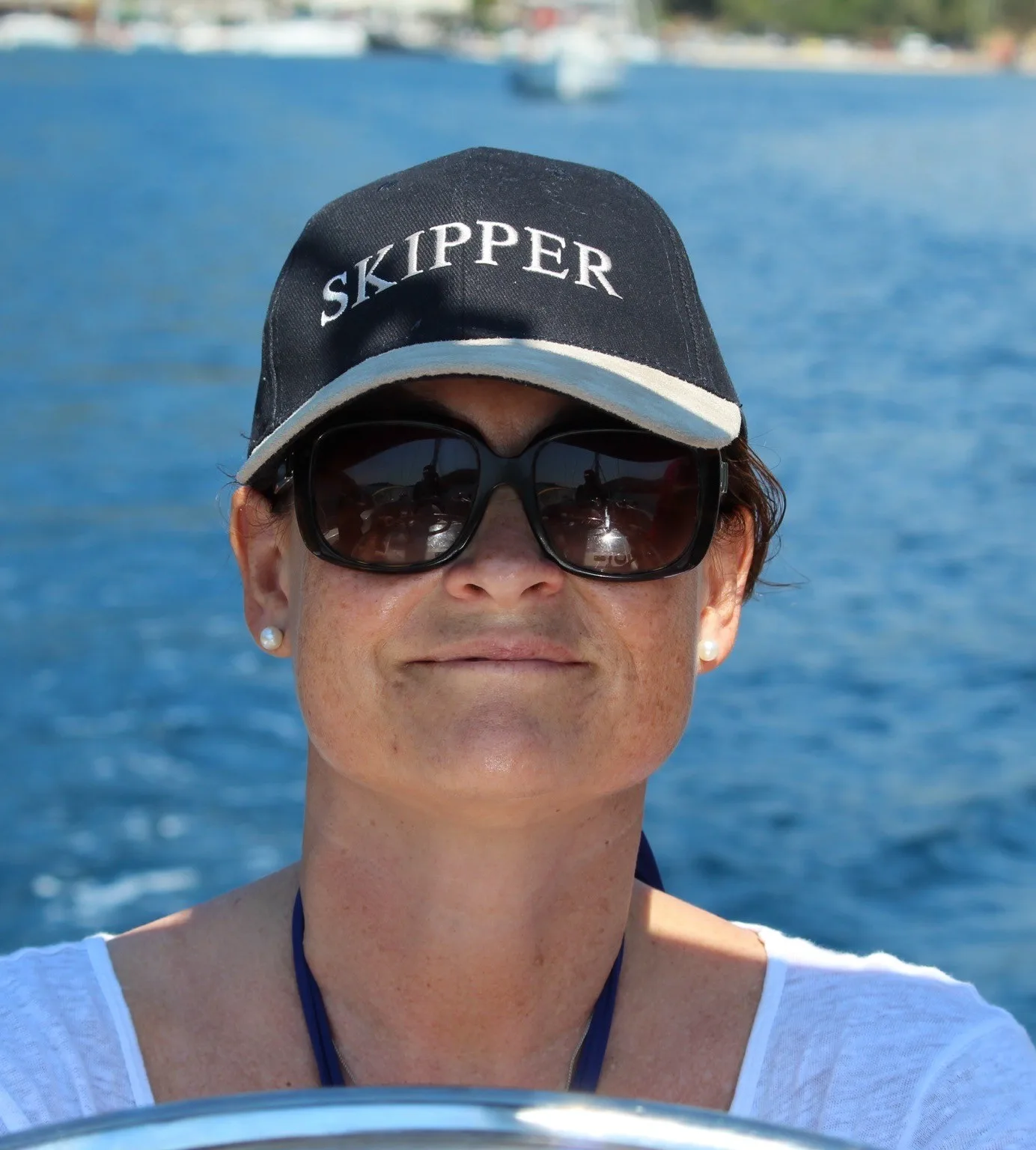 Woman steering a boat