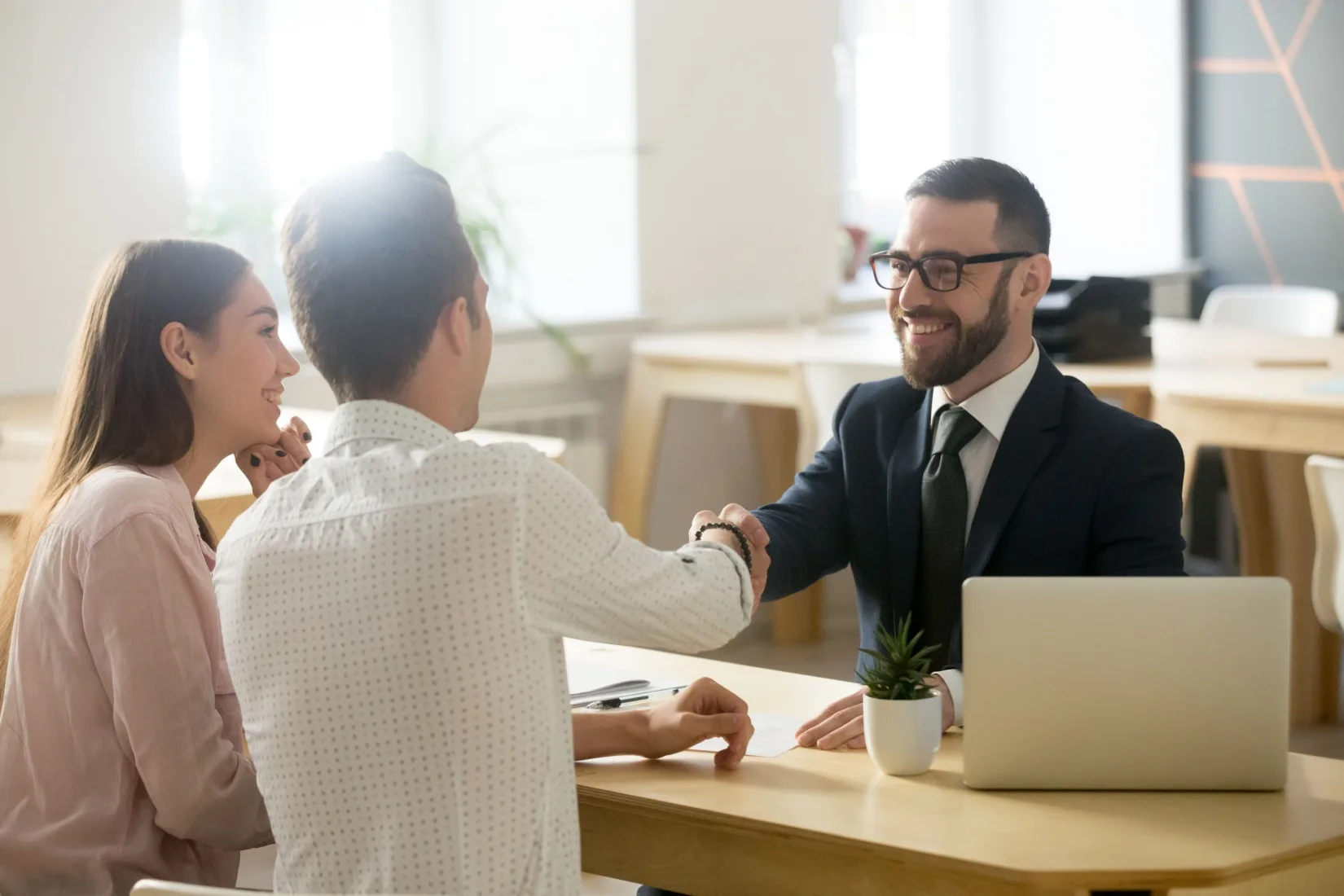 A couple meeting with a financial planner.