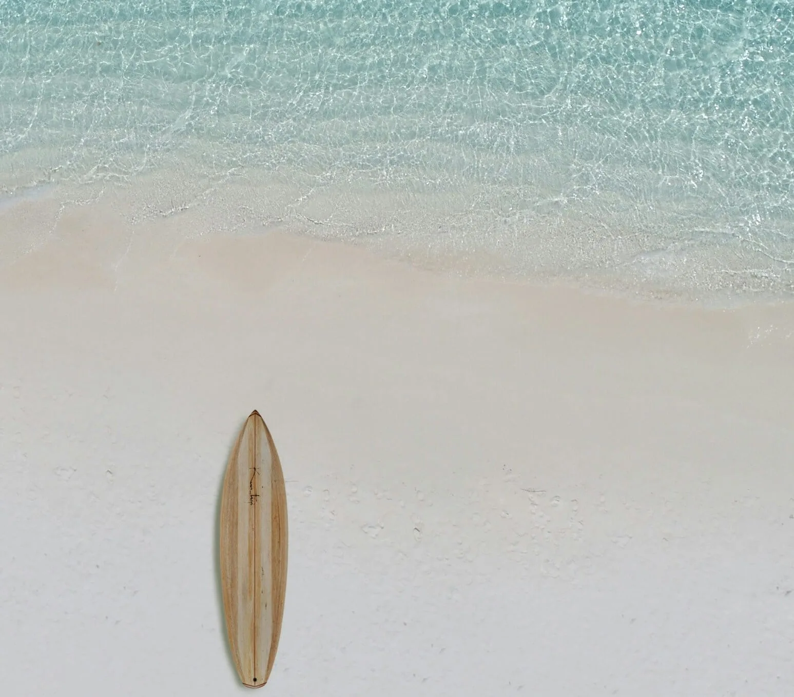 Surfboard on sand