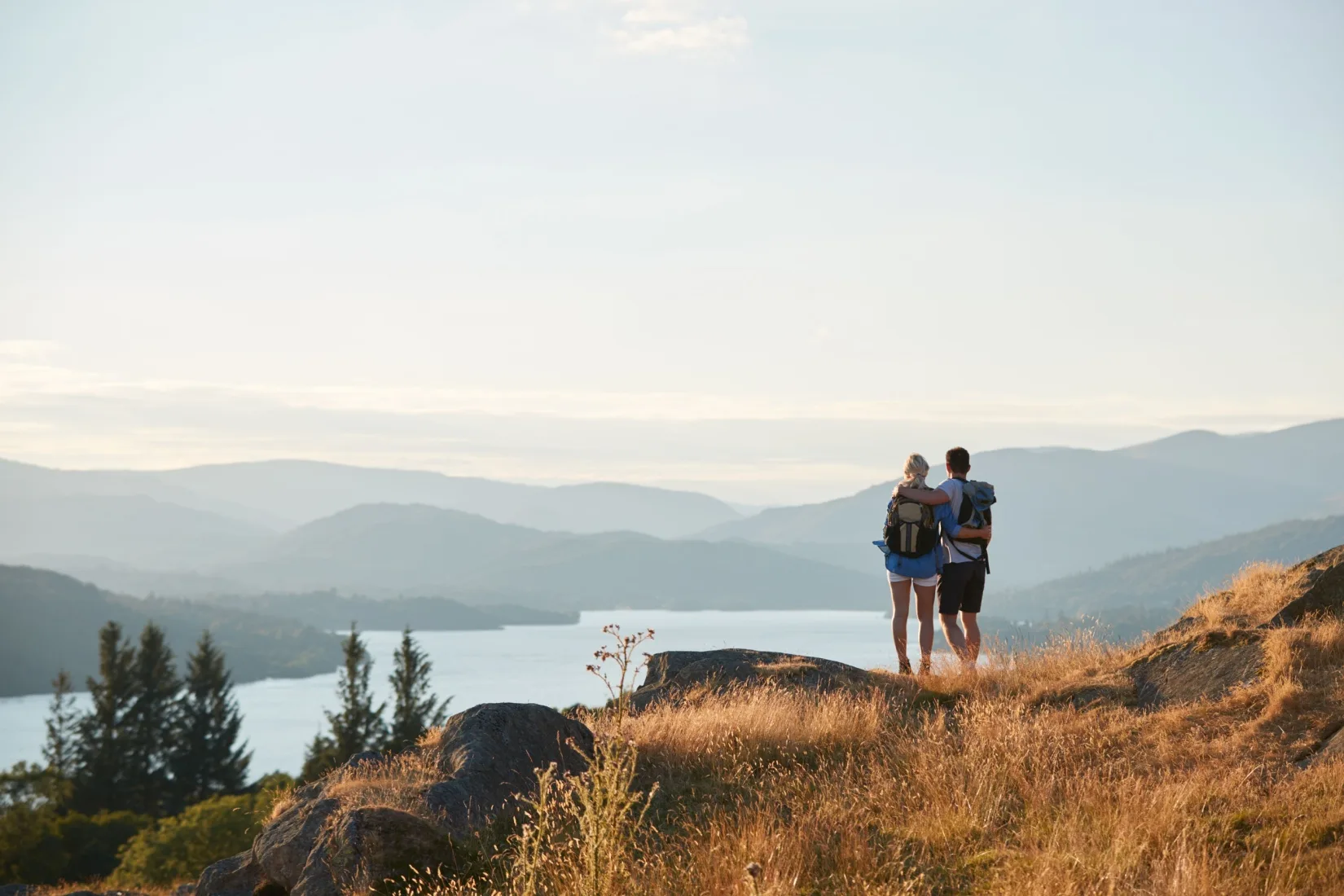 A couple hiking in the Lake District.