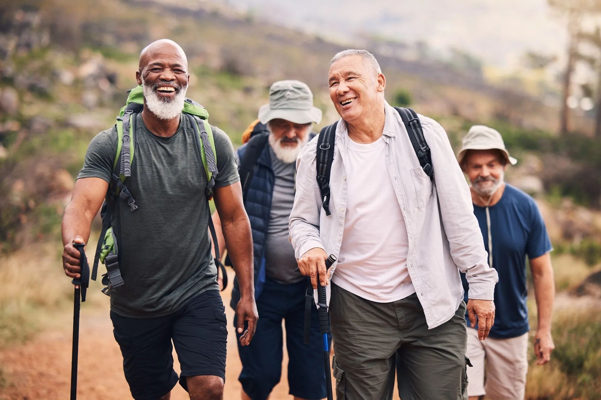 A group of men hiking together.