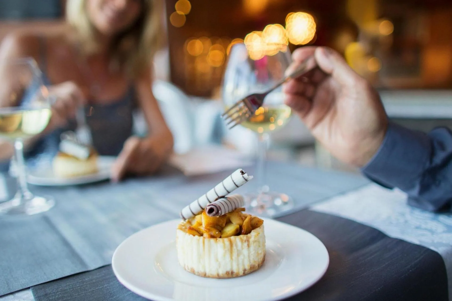 A couple enjoying a meal in a restaurant.