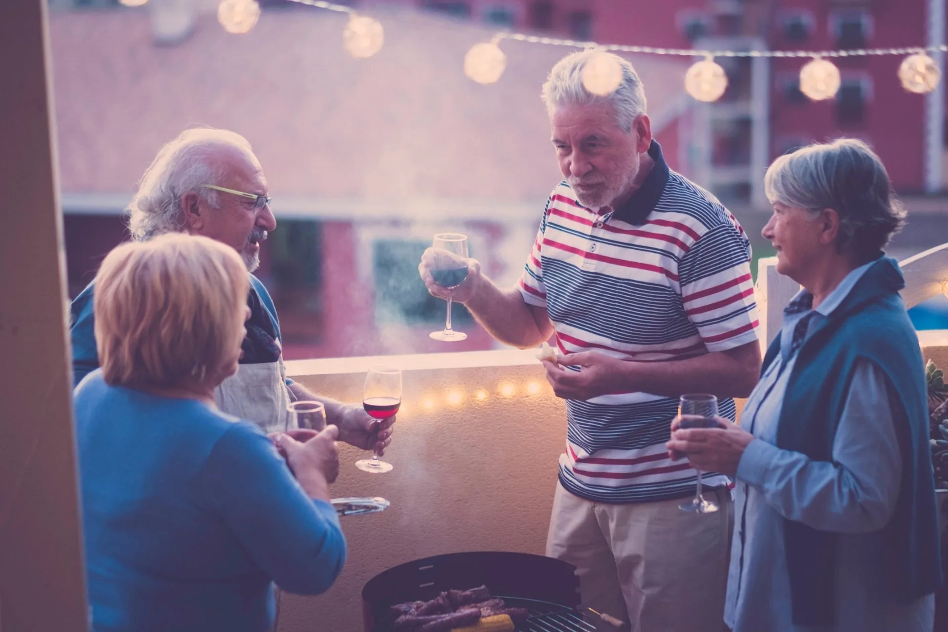 A group of people taking and drinking wine.